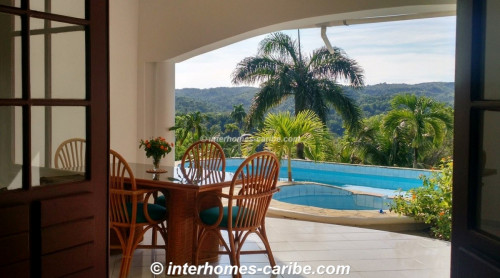 photos for SOSUA: Charming house in a quiet residential area with green countryside.